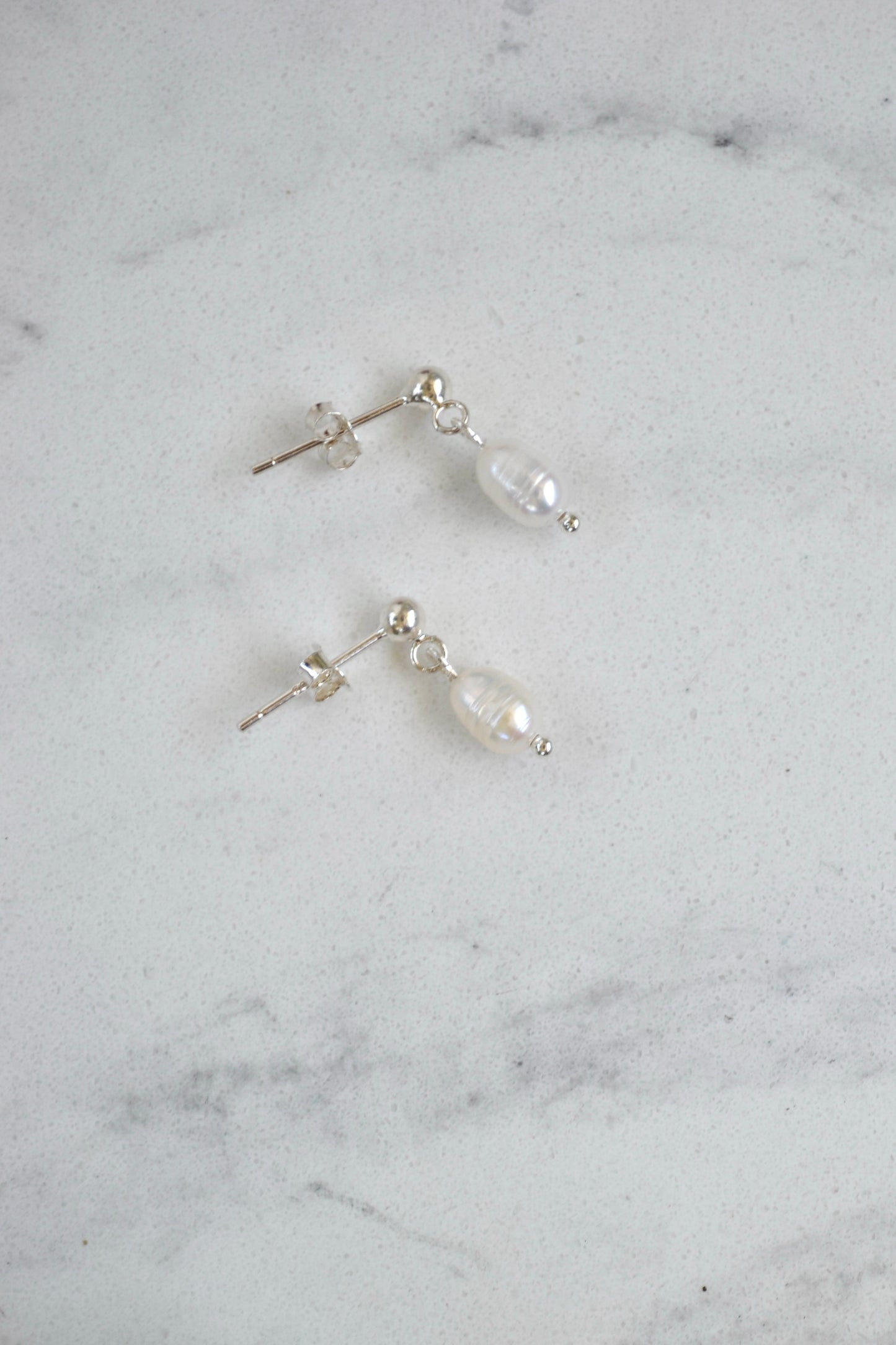 Delicate Pearl Studs
